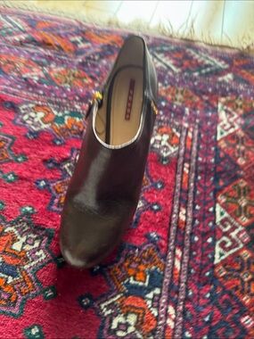 Prada Brown Leather Heeled Slip-On with Gold Accent